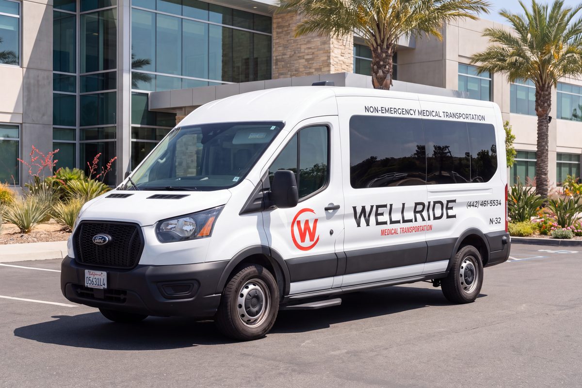Wellride wheelchair and gurney transportation van parked outside a San Diego medical center